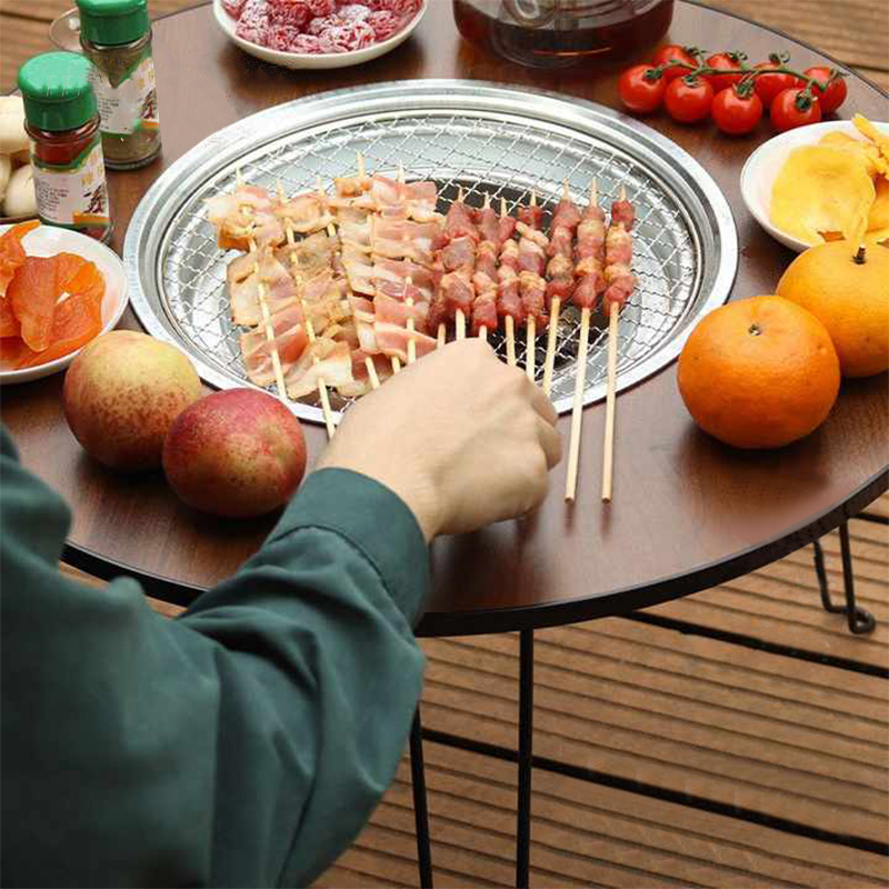 Mesa de fuego de campamento plegable redondo al aire libre